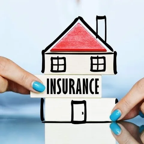 Blocks stacked into a small house labeled Insurance